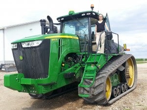 Suzy on Tim Richters tractor July 2013