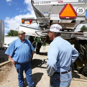 An ag retailer advises a soybean farmer