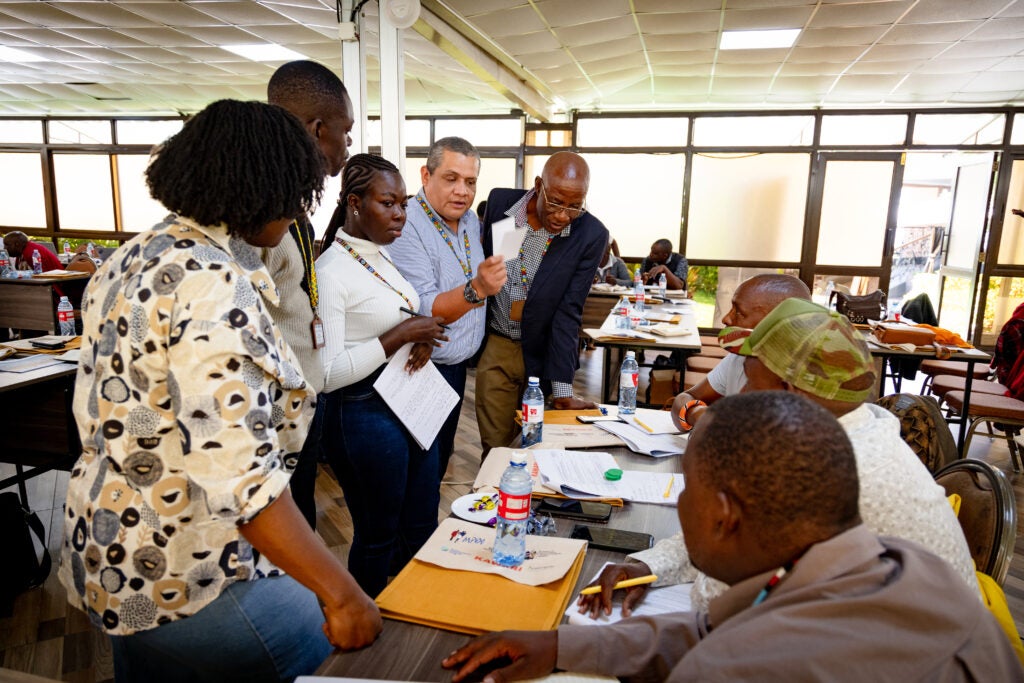 A moment of exchange between government officials and Indigenous People and local community representatives during a workshop in Nairobi, Kenya focused on equitable carbon finance. Photo by Diego Acosta-López/EDF