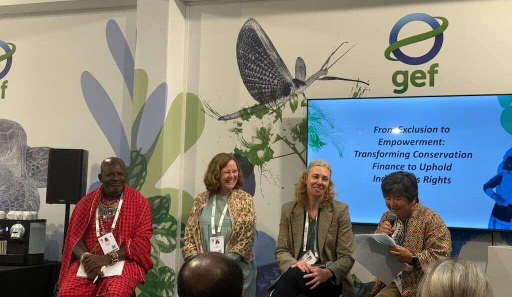 IUCN World Conservation Congress 2025 panel, ‘From Exclusion to Empowerment: Transforming Conservation Finance to Uphold Indigenous Rights’. Panelists, left to right: Malih Ole Kaunga (Founder and Executive Director, IMPACT Kenya), Stefanie Lang (Executive Director, Legacy Landscapes Fund), Annie Mark (Senior Director, Global Partnerships, Environmental Defense Fund) and Joan Carling (Executive Director, Indigenous Peoples Rights International)