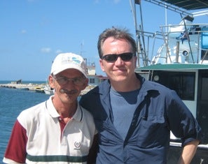 Dan Whittle in Cuba near Isla de la Juventud with one of EDF's Cuban marine partners.