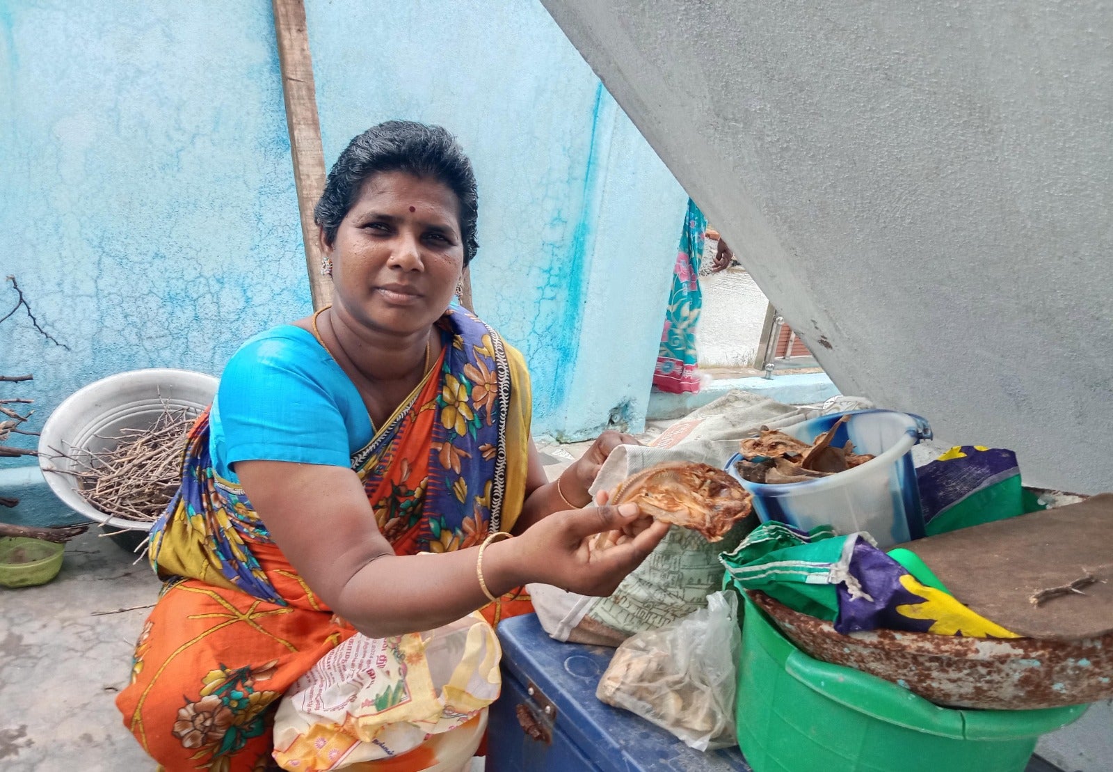 Portable mini solar dryers installed near fisherwomen's homes in a Tamil Nadu fishing village allow hygienic fish drying without the need for constant supervision. Photo credit: MSSRF.