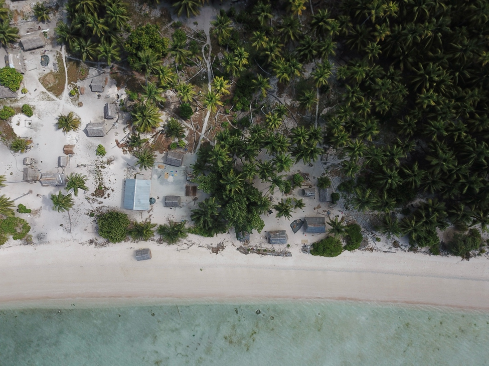 Aerial view of a small-scale fishing village in Tabiteuea South, Kiribati. Photo credit: Jacob Eurich.