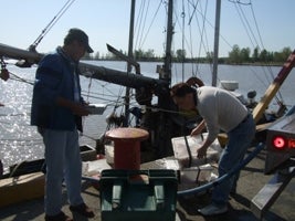 Fishermen (from Belize) exchange viewing catch shares management in Vancouver, BC.