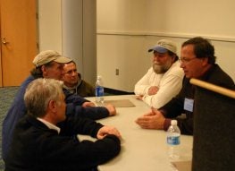 Gulf fishermen and Maryland watermen talk at the East Coast Commercial Fishermen's & Aquaculture Trade Exposition in Ocean City, Maryland.