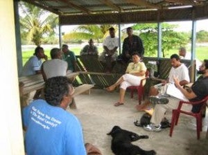 Community meeting of fishermen in Belize.