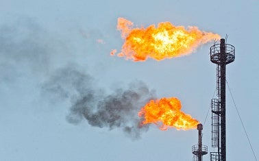Methane is flared from a natural gas well site.