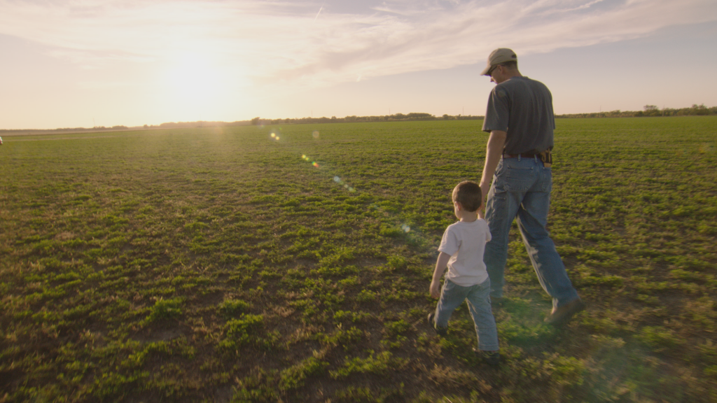 Father and son on a farm