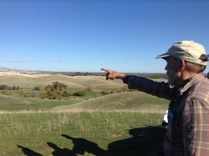 John Anderson overlooking his riparian forest and restoration area on Yanci Ranch. 