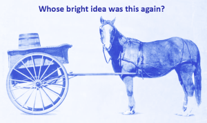Horse attached to the wrong end of the cart. Caption says "Whose bright idea was this again?"