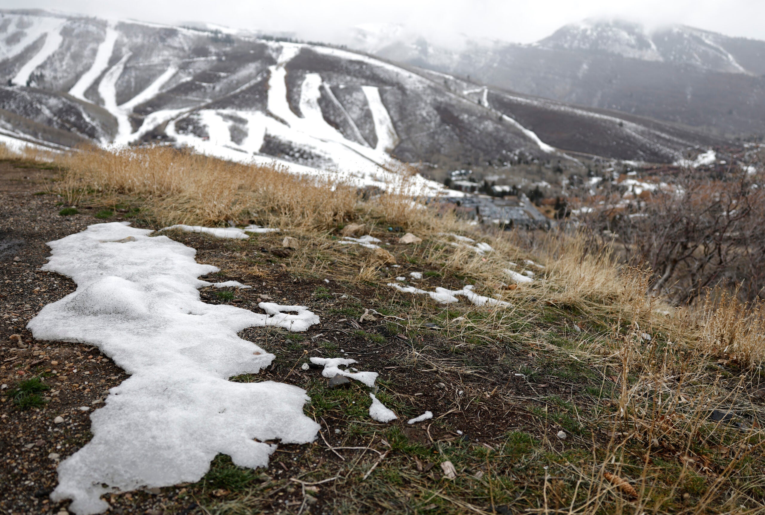 Mountain hillside with just a patch of snow