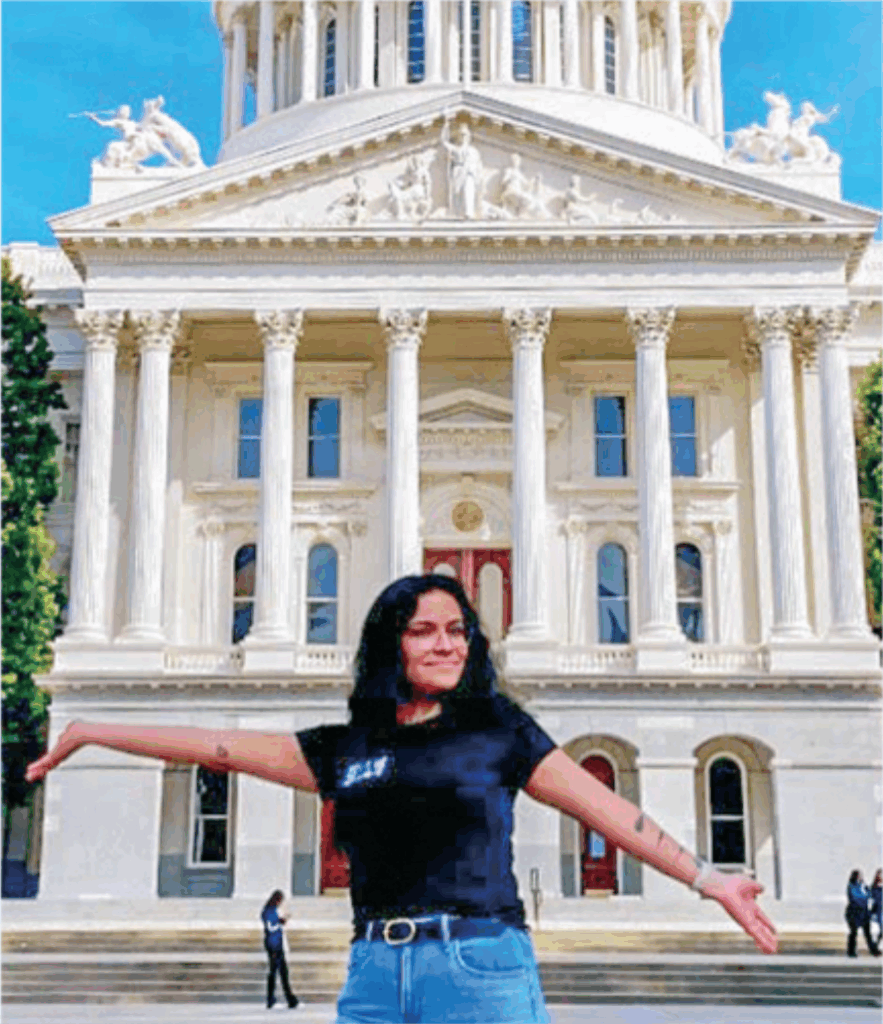 Destiny Montes a graduate of the Water Leadership Institute, in front of California Capitol